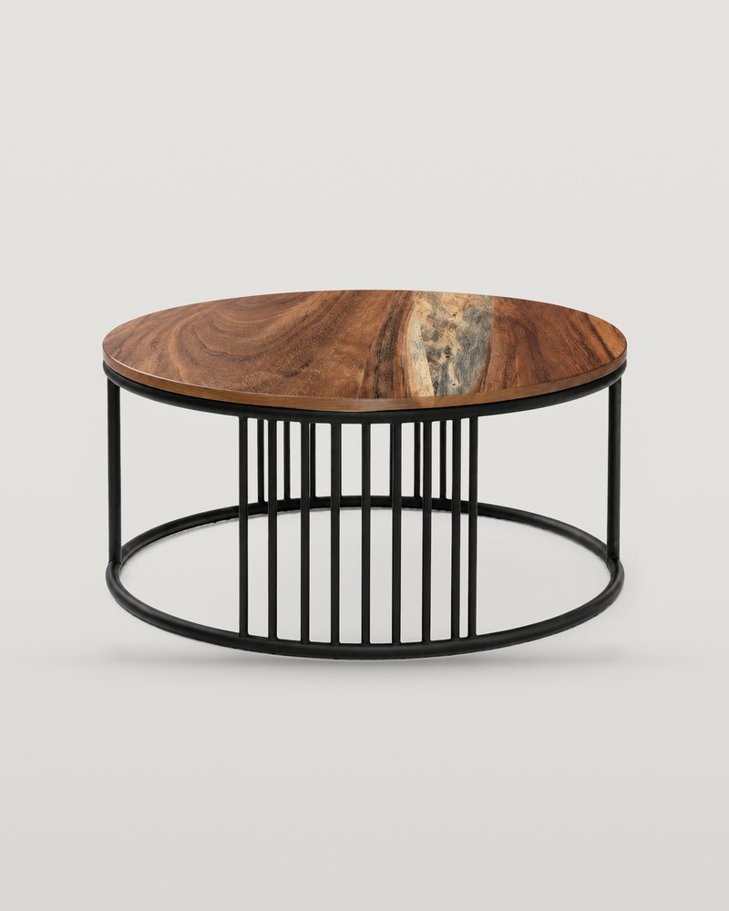 Mesa de Centro Loretta: cubierta redonda de chapa de madera con veta clara al centro sobre base circular de barras verticales de acero negro, sobre fondo hueso